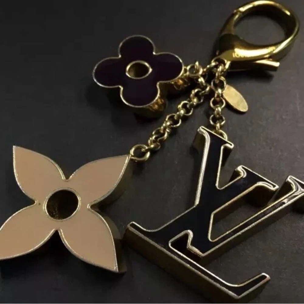 Louis Vuitton Fleur De Monogram Gold Tone Key Chain/charm. SOLD. SOLD